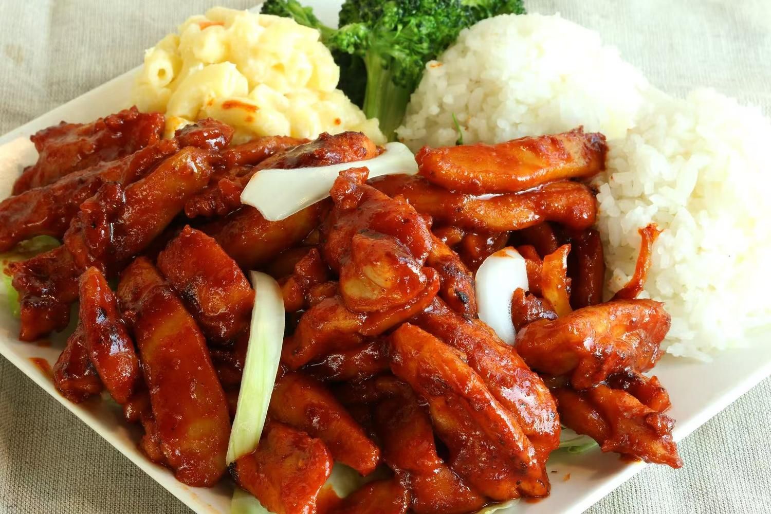 Spicy sticky chicken with sides at Islands Hawaiian BBQ Restaurant in Gilbert