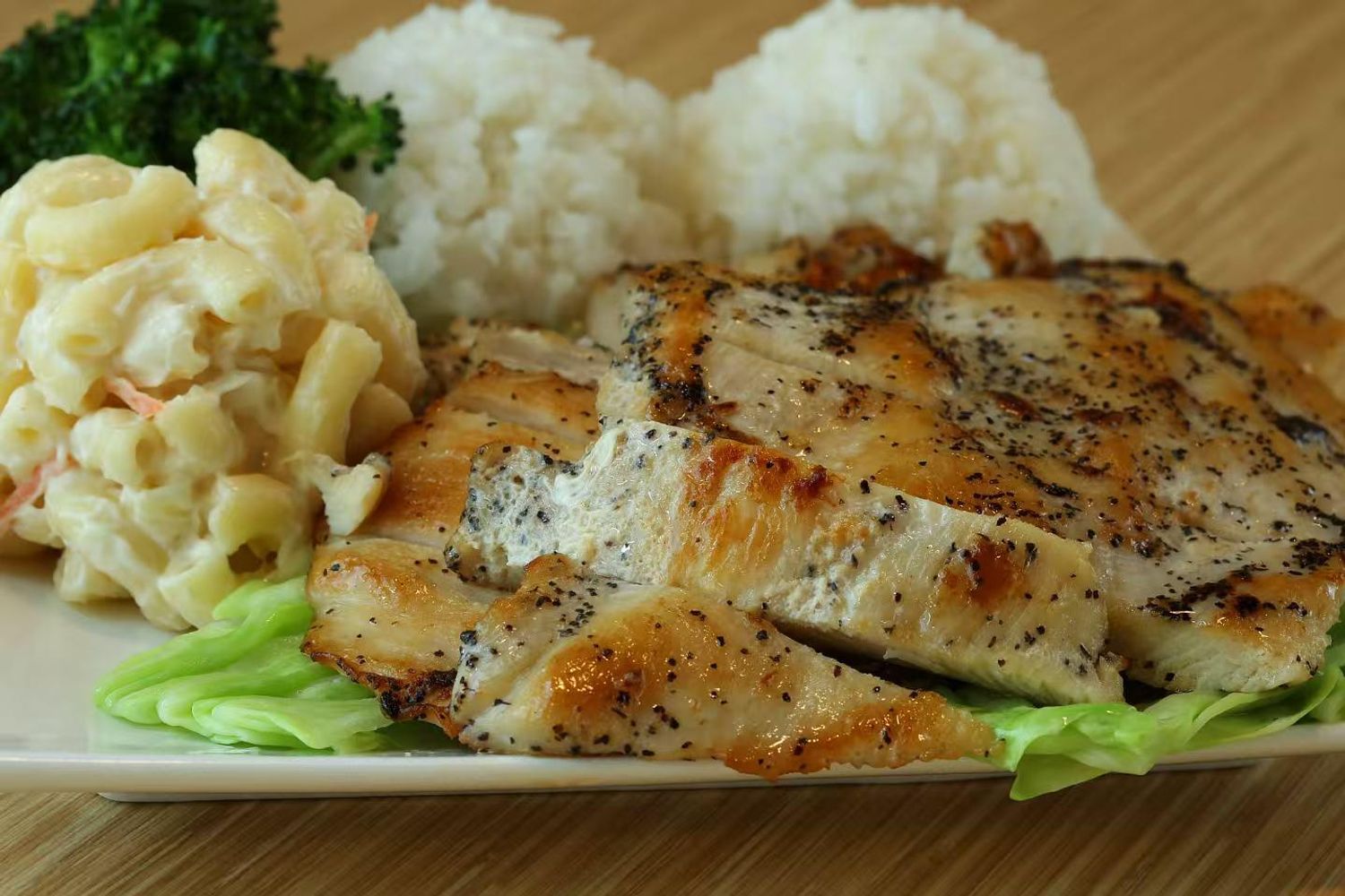 Seasoned grilled chicken with sides at Islands Hawaiian BBQ Restaurant in Gilbert