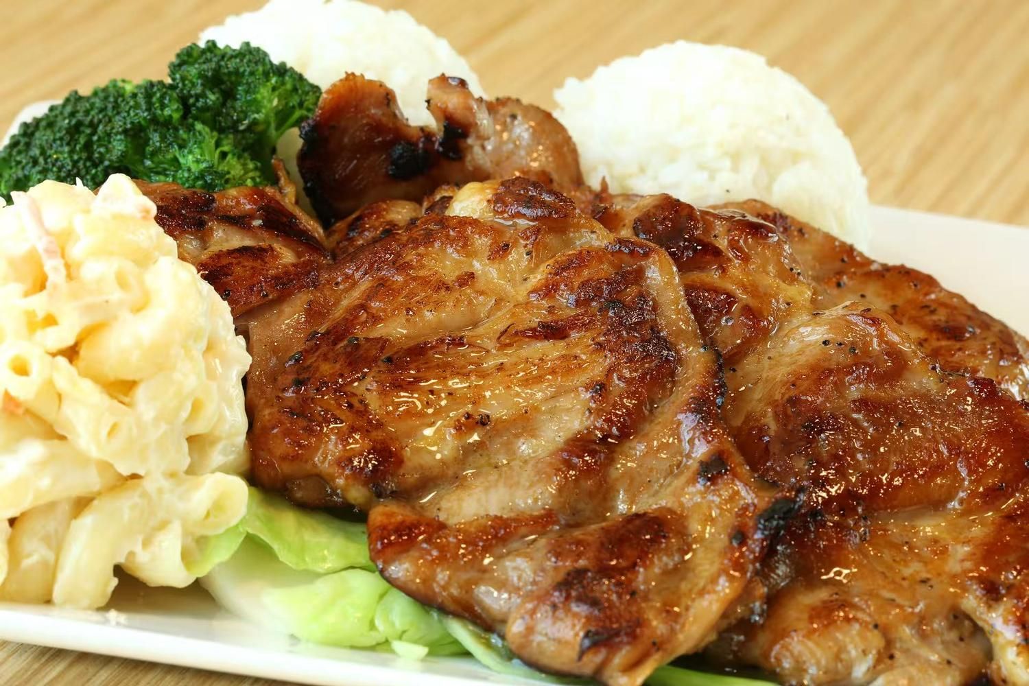 Seasoned grilled chicken with sides at Islands Hawaiian BBQ Restaurant in Gilbert