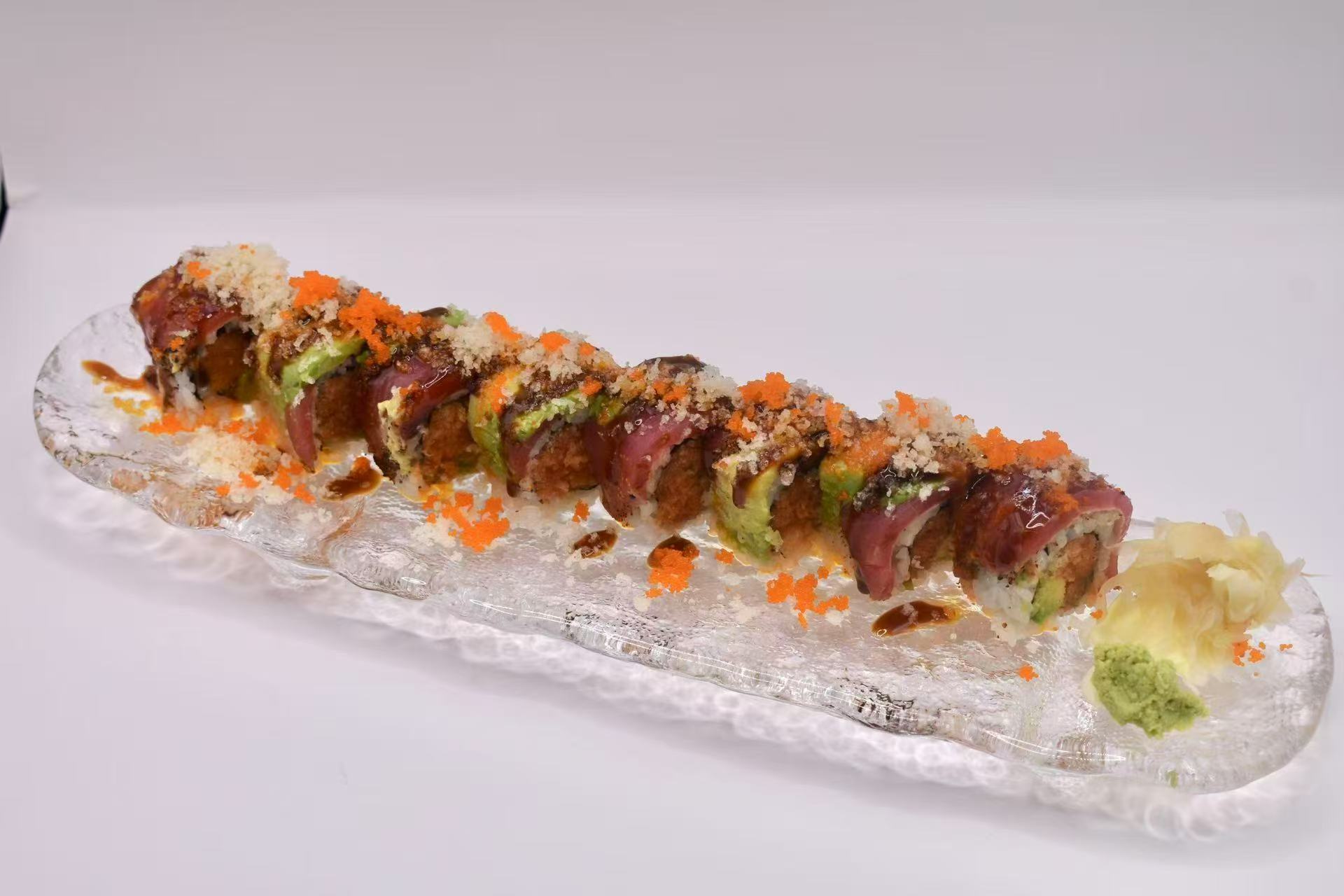 Tuna roll with various toppings at Isohama,a Japanese Restaurant in New York.