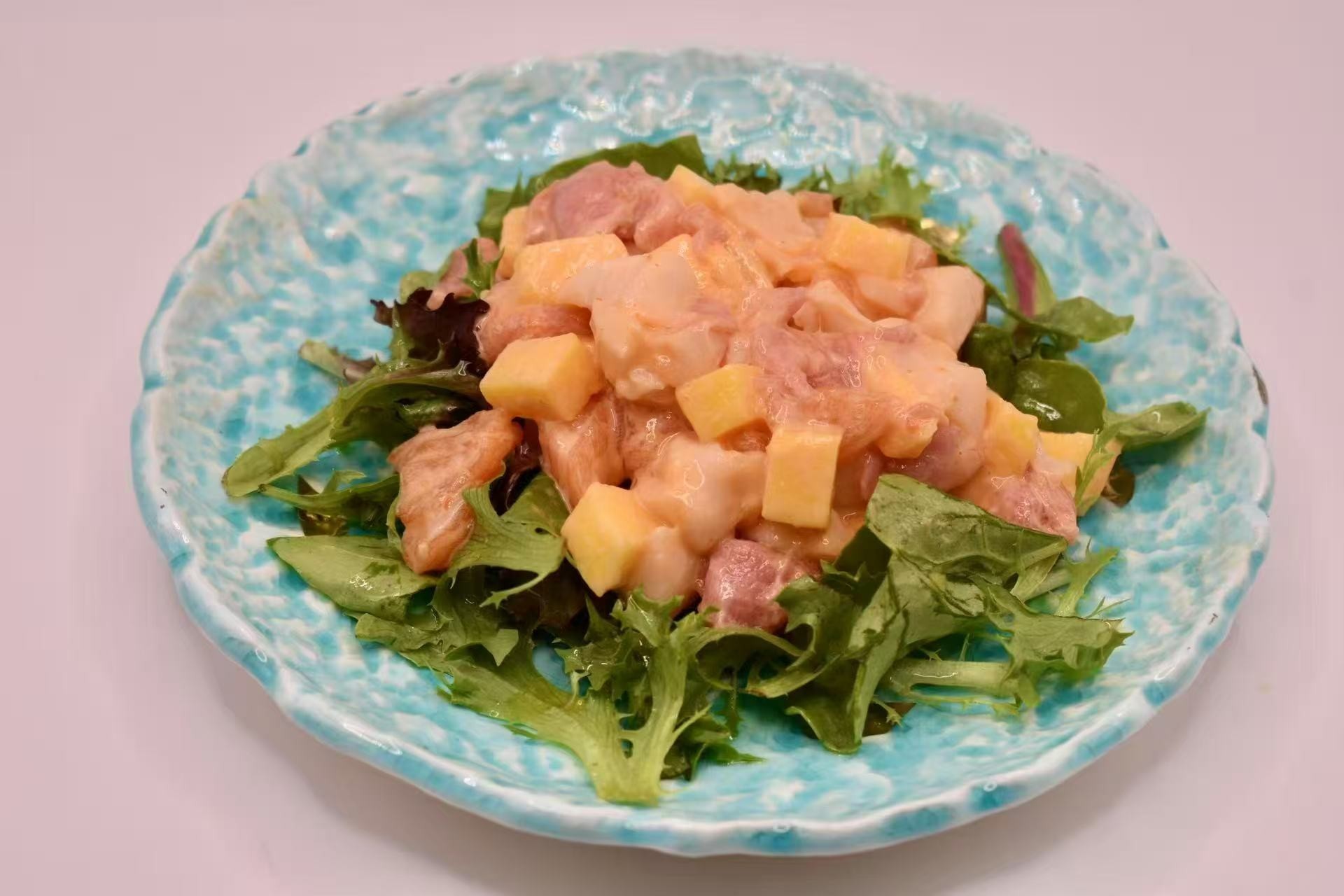 Sashimi salad with mango and greens at Isohama,a Japanese Restaurant in New York.