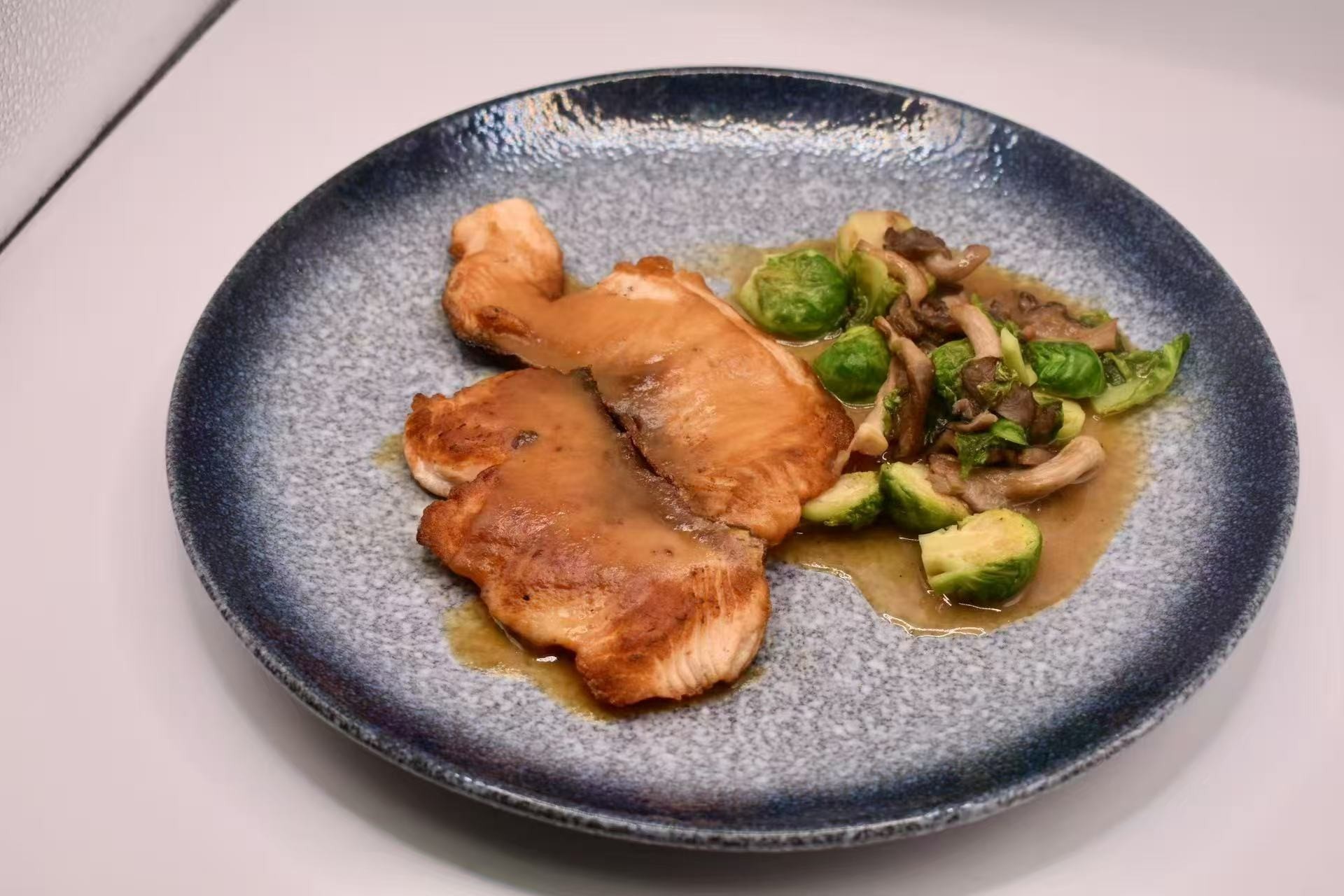 Pan - roasted salmon with veggies at Isohama,a Japanese Restaurant in New York.