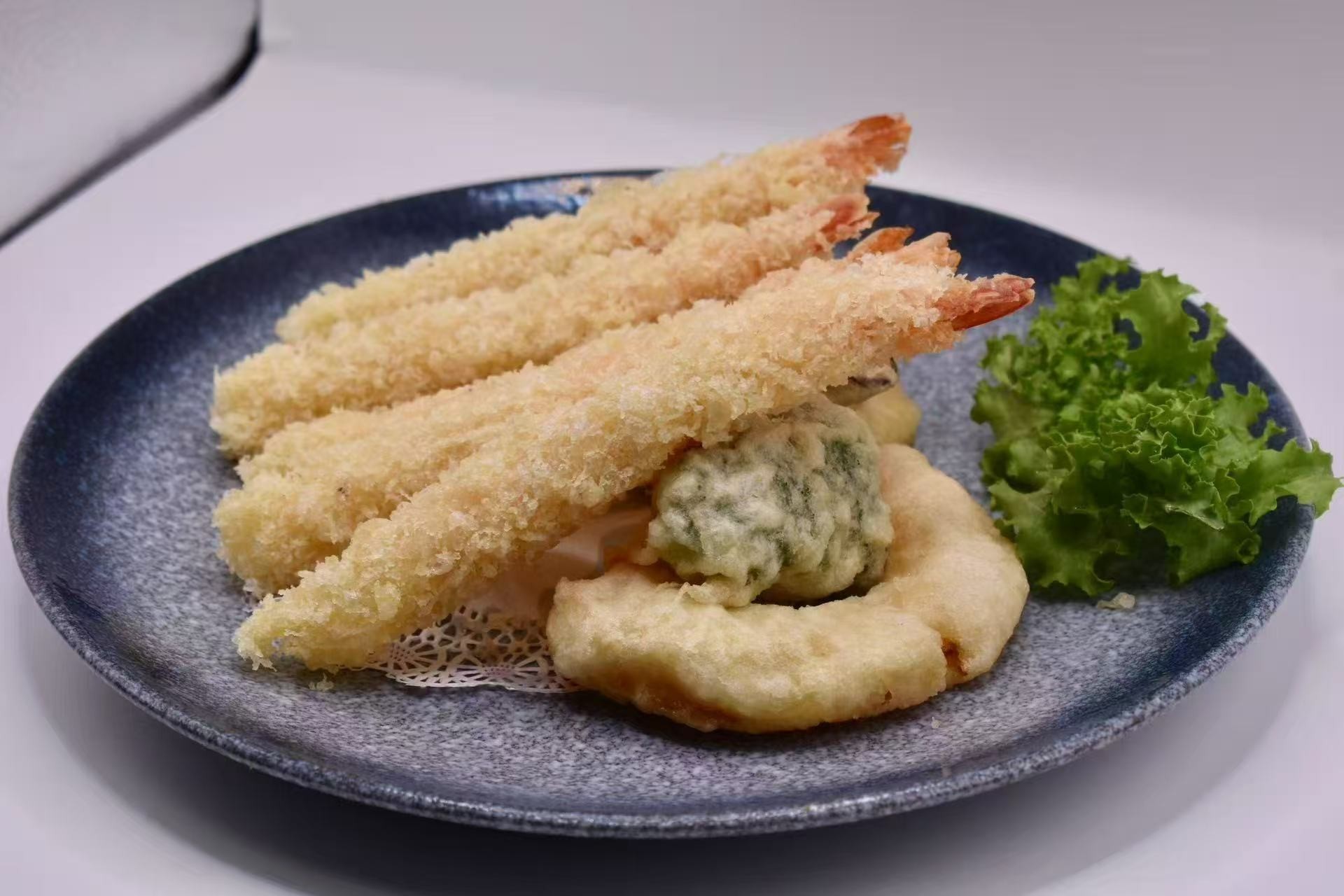 Shrimp tempura with other tempura items at Isohama,a Japanese Restaurant in New York.