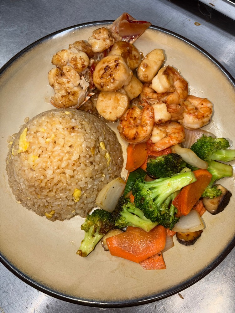 Hibachi seafood combo with fried rice, scallops, shrimp and vegetables