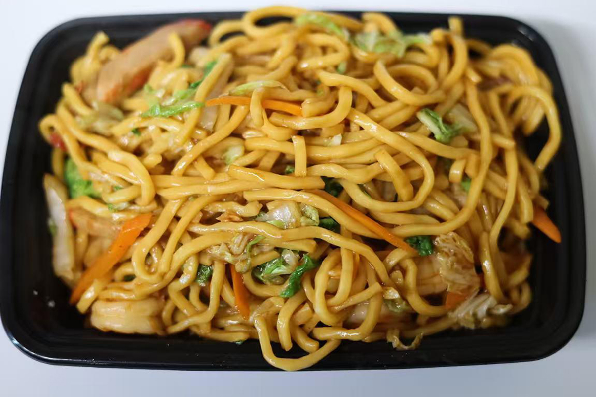 Savory vegetable seafood stir-fried thick egg noodles at Jackie Chan's Chinese Restaurant in Philadelphia