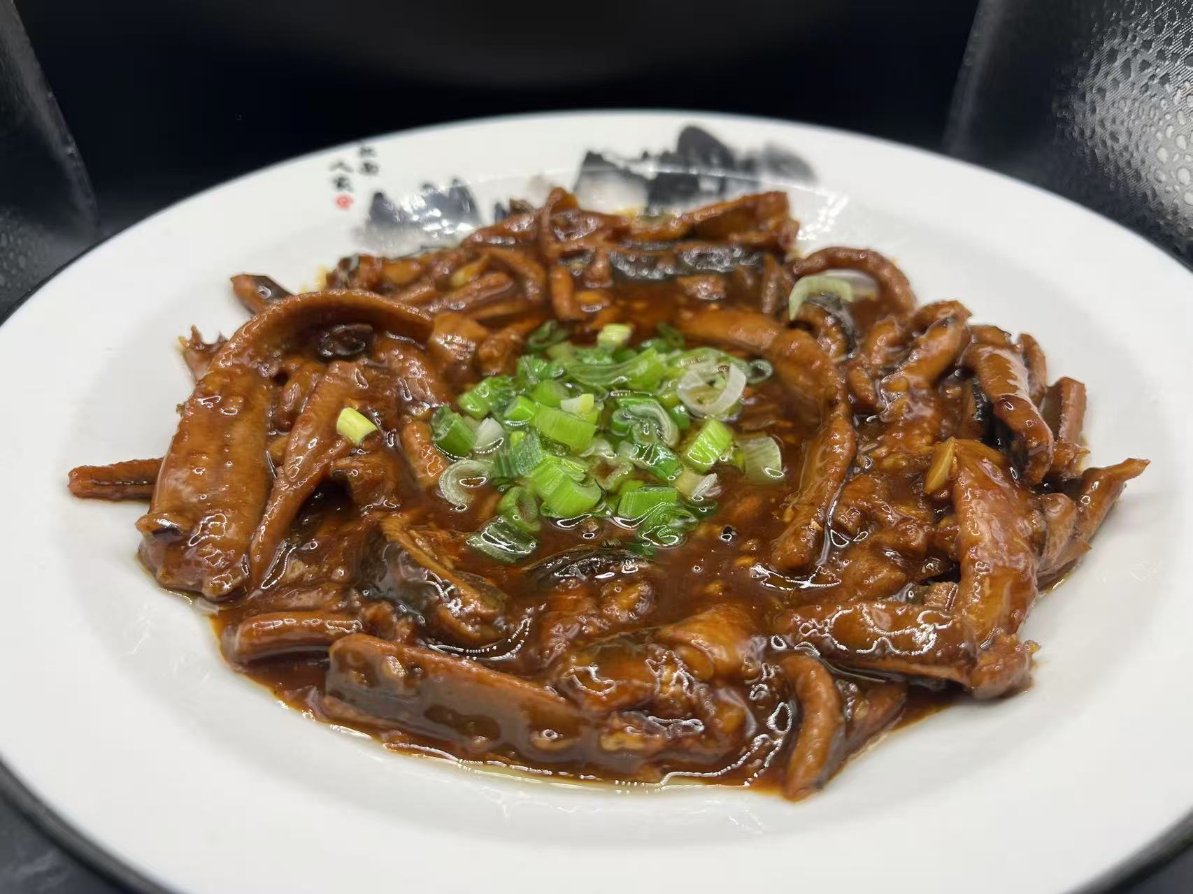 Braised eel strips in thick soy sauce topped with green onion at JiangNan Philadelphia, a Chinese Restaurant in Philadelphi