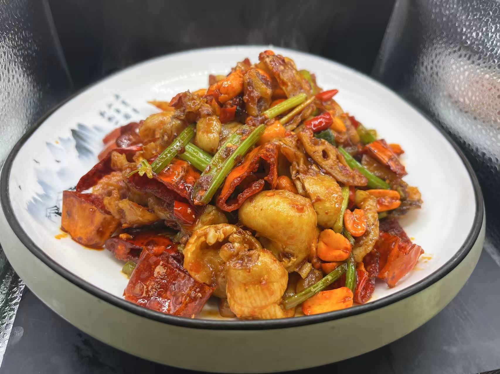 Spicy stir-fried frog legs with celery, chili and peanuts at JiangNan Philadelphia, a Chinese Restaurant in Philadelphi