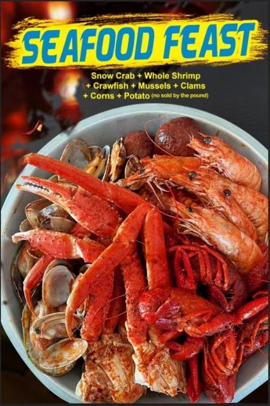 Seafood Feast Platter with Snow Crab, Shrimp, Crawfish, Mussels, Clams, Corn and Potatoes