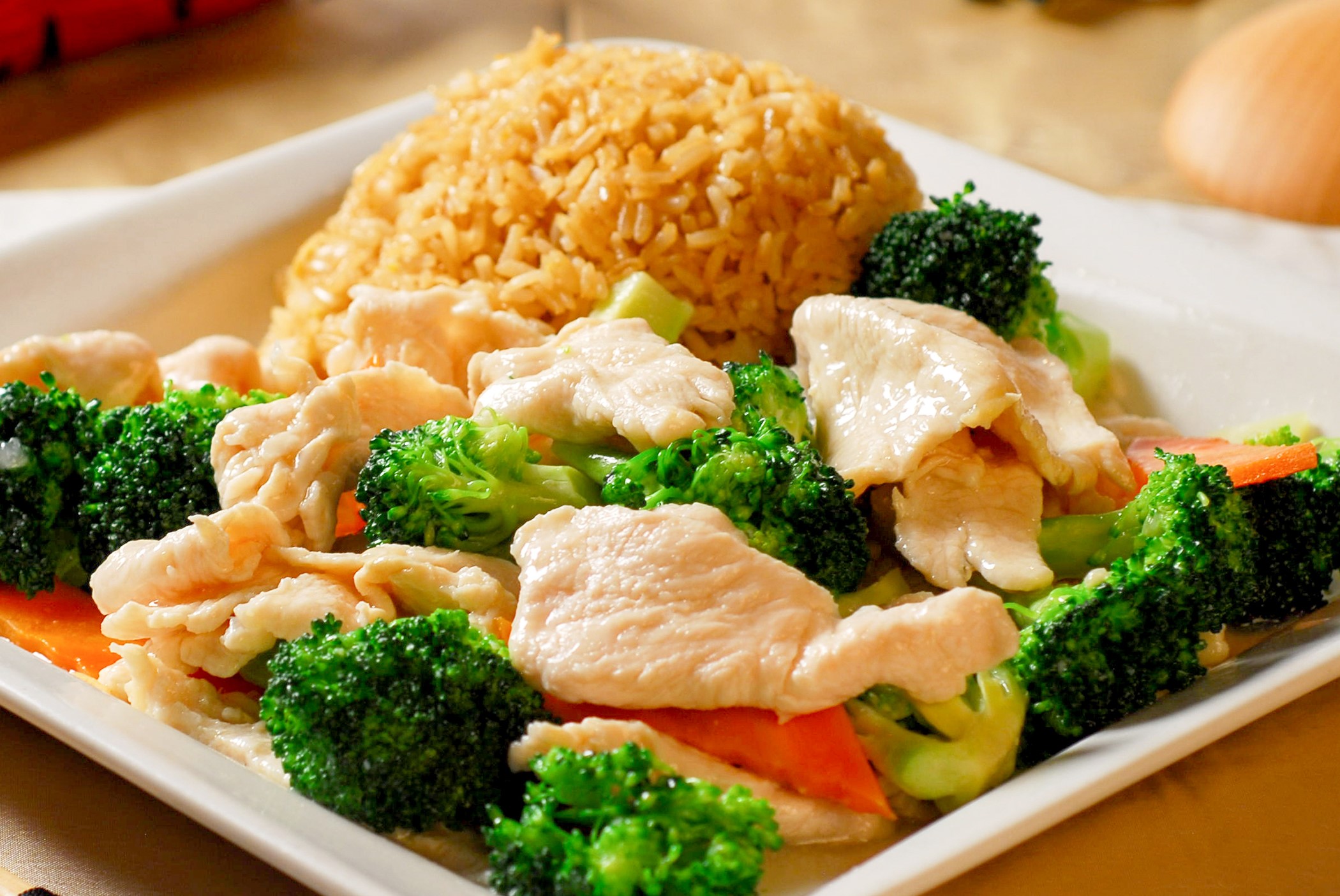 Chicken stir - fried with broccoli and carrots, served with rice at Jin28 Express, a Chinese Restaurant in Highland Park
