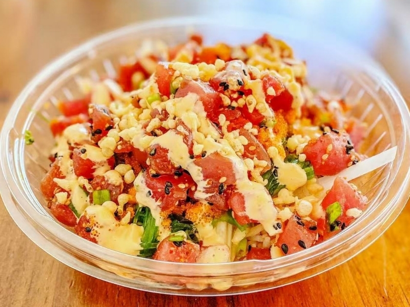 Jin-Poke-Asian-Restaurant-Build-your-own-Seminole A bowl with tuna, sesame seeds, and sauces at Jin Poke, a Asian Restaurant in Seminole