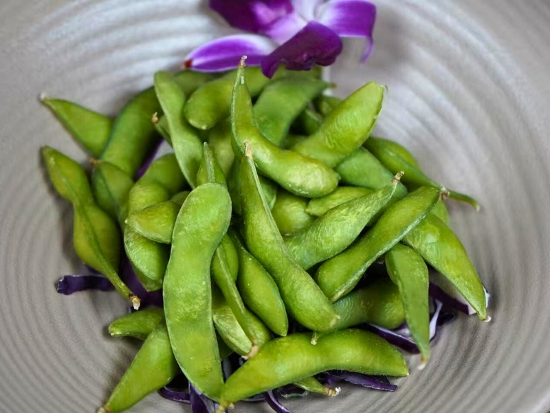 Steamed edamame pods served as appetizer at Koi Ramen & Sushi, a Japanese Restaurant in Johnstown