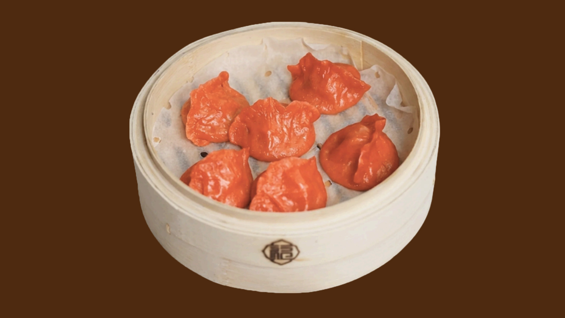 Bright red crystal shrimp dumplings in bamboo steamer at JoyFu Dim Sum, a Dim Sum Restaurant in New York