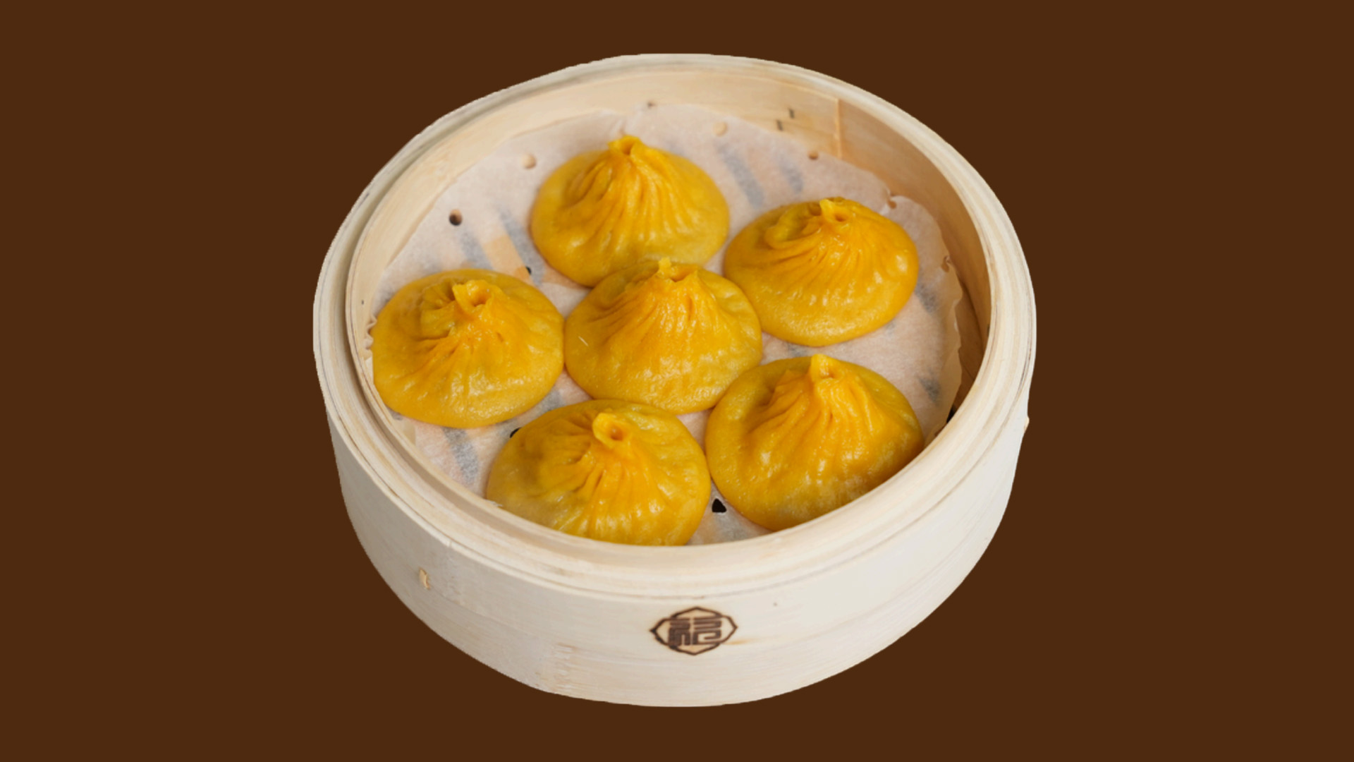 Chicken Soup Dumplings in bamboo steamer at JoyFu Dim Sum, a Dim Sum Restaurant in New York