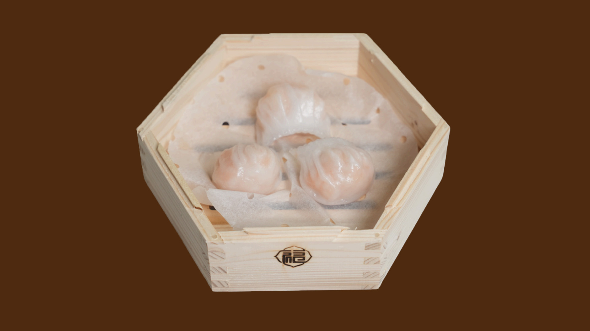 Classic shrimp crystal dumplings in hexagonal wooden tray at JoyFu Dim Sum, a Dim Sum Restaurant in New York