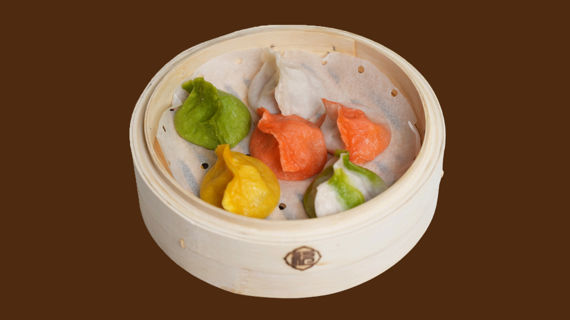 Colorful crystal shrimp dumplings in bamboo steamer at JoyFu Dim Sum, a Dim Sum Restaurant in New York