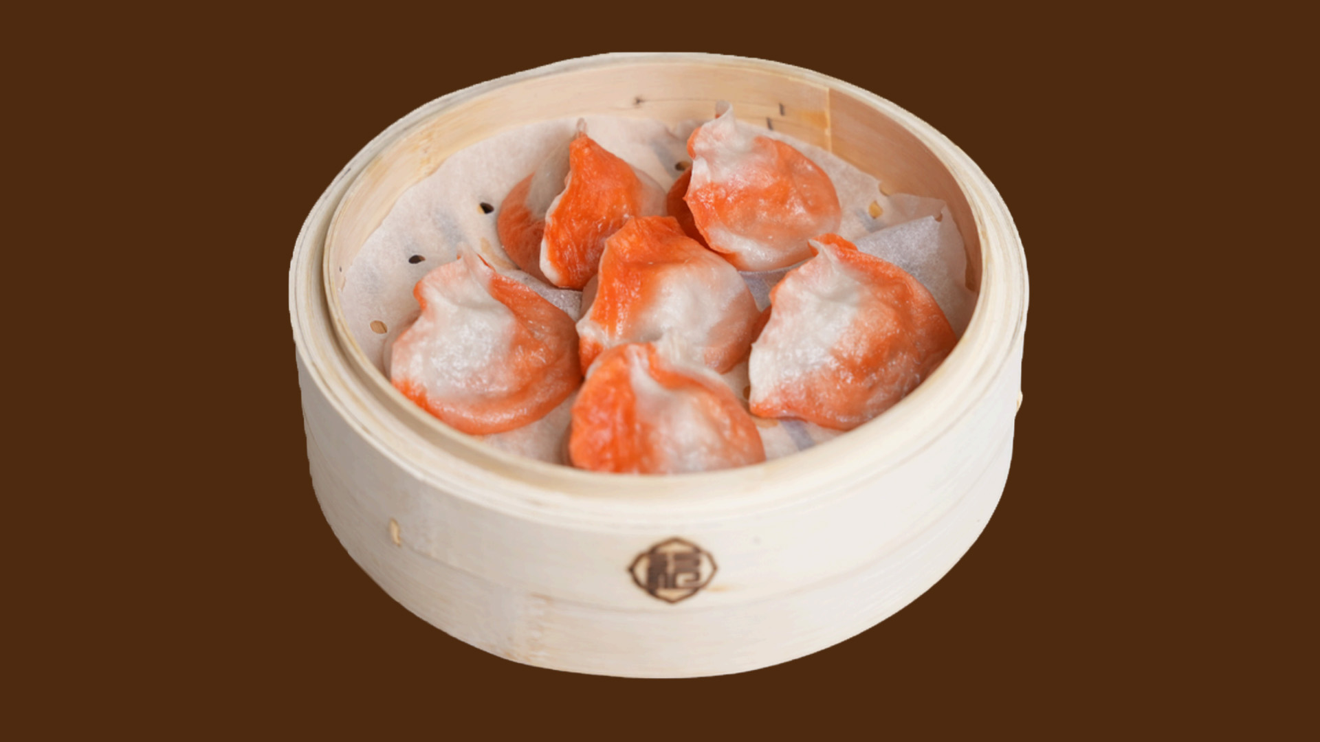 Red and white crystal shrimp dumplings in bamboo steamer at JoyFu Dim Sum, a Dim Sum Restaurant in New York