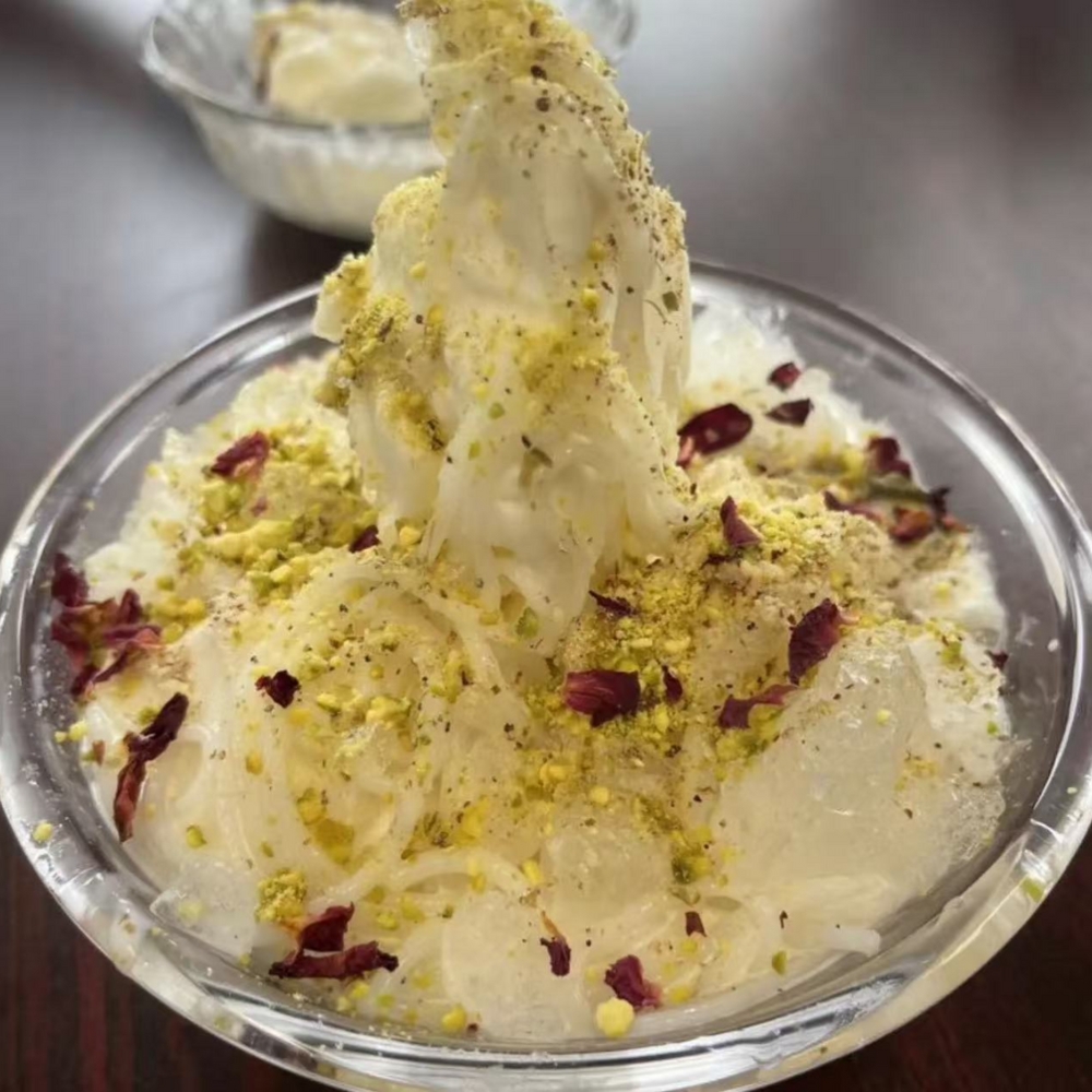 Pistachio rose ice cream with toppings at Kabul Icy Treats Cafe شیریخ و ژاله, a Ice Cream Shop in Concord