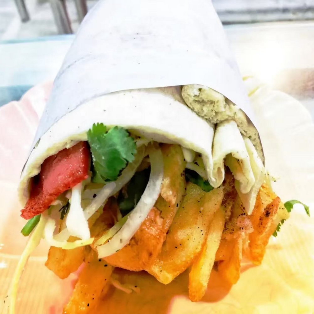 Wrap with veggies and fries at Kabul Icy Treats Cafe شیریخ و ژاله, a Ice Cream Shop in Concord