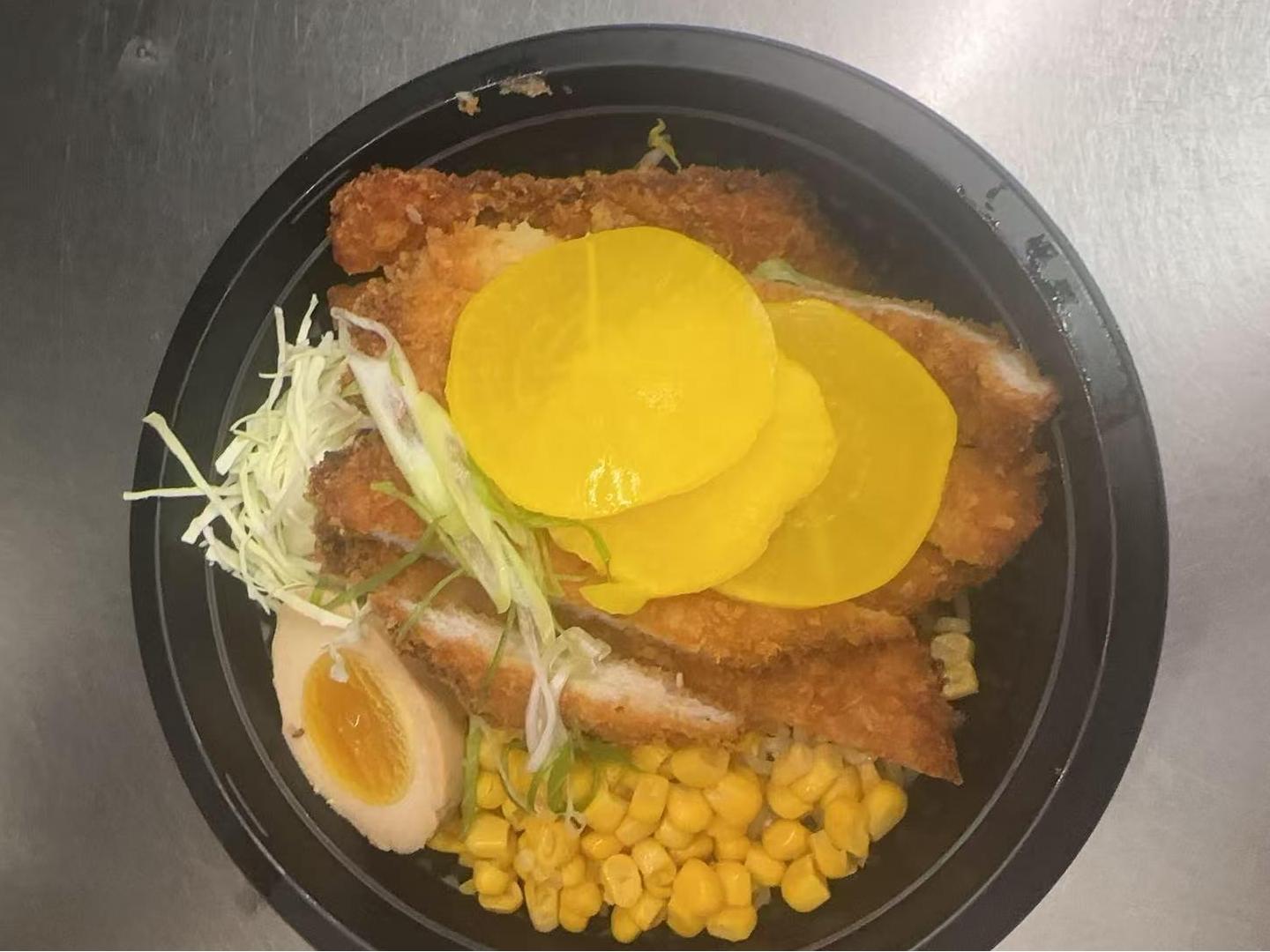 Crispy Chicken Ramen with crispy chicken, egg, and veggies at Kakkoii Sushi and Ramen, a Japanese restaurant in Malden