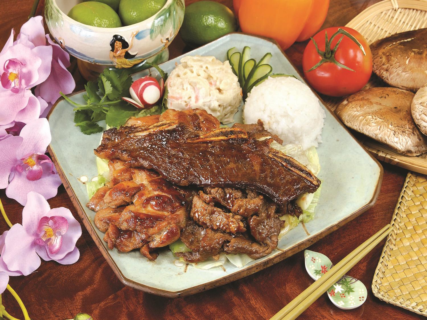 Kaua-Hawaiian-BBQ-Hawaiian-restaurant-Grilled-Meat-Combination-Riverside Grilled Meat Combination Assorted grilled meats with rice and sides at Kaua Hawaiian BBQ, a Hawaiian restaurant in Riverside