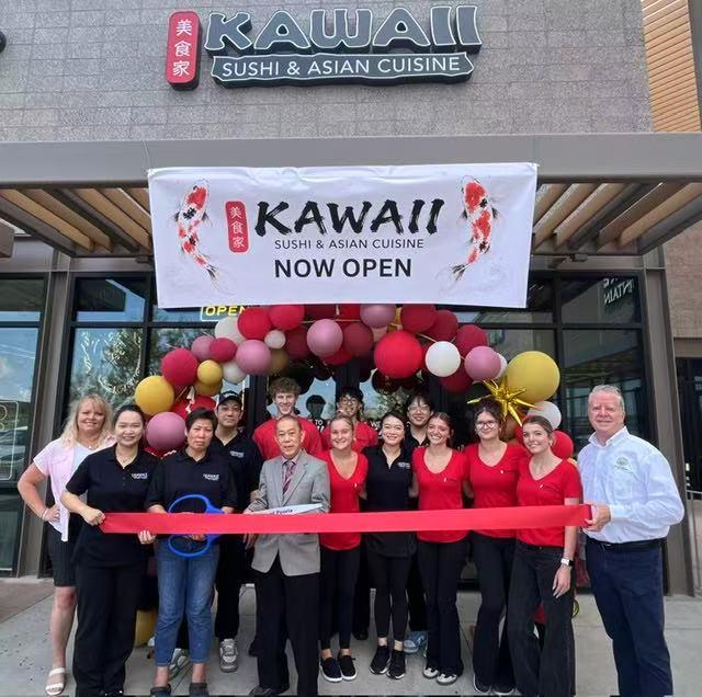Grand opening ribbon cutting group photo outside Kawaii Sushi restaurant with balloon decor at Kawaii Sushi & Asian Cuisine, Asian Restaurant in Peoria