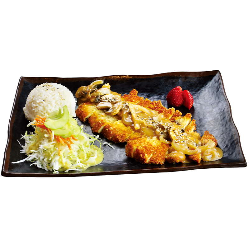 Crispy pork cutlet with mushroom gravy, rice and fresh vegetable slaw at K-Bop, a Korean Restaurant in Austin