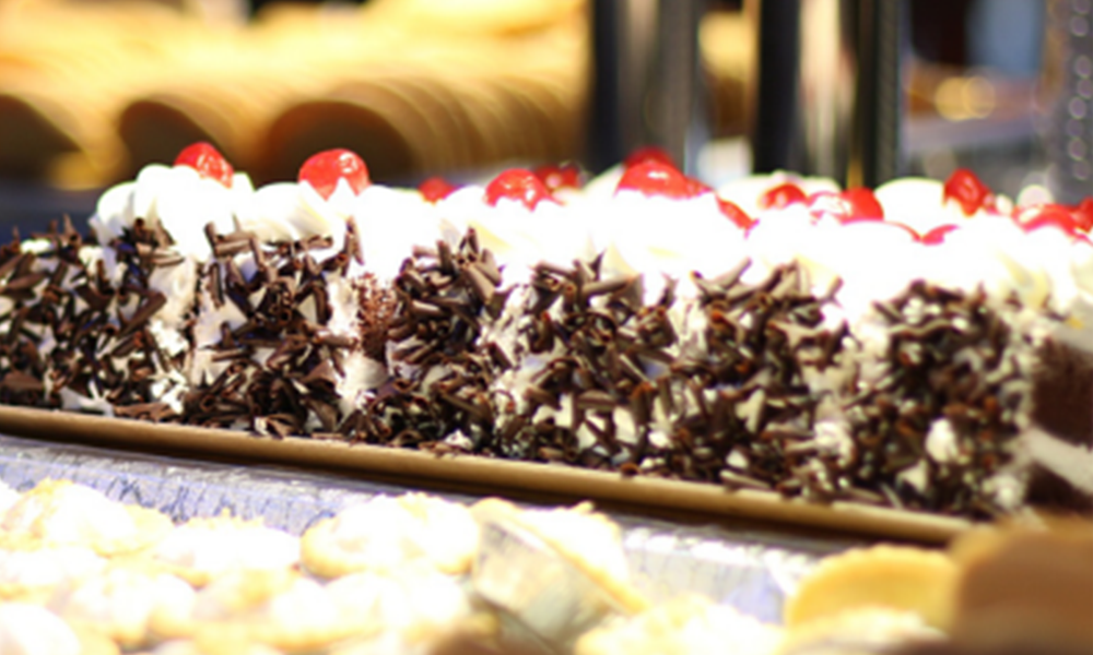 Creamy cake with chocolate shavings & cherries at Kingdom Buffet, a Buffet Restaurant in Newington