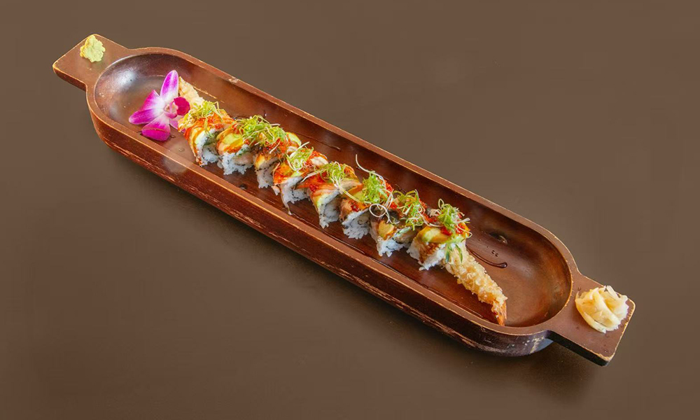 Sushi roll with various toppings and a tempura shrimp tail at Kenichi Asian Bistro, a Asian Restaurant in Worcester
