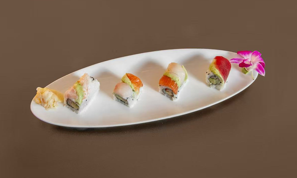 Colorful sushi rolls with assorted fish and avocado at Kenichi Asian Bistro, a Asian Restaurant in Worcester