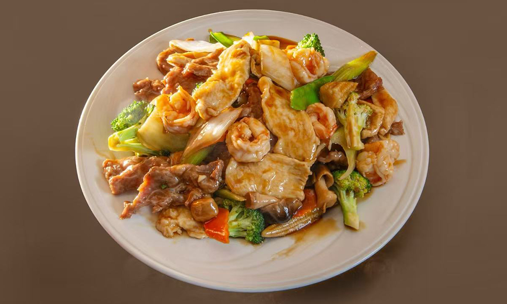 Stir-fried noodles with meat, shrimp, and vegetables in savory sauce at Kenichi Asian Bistro, a Asian Restaurant in Worcester