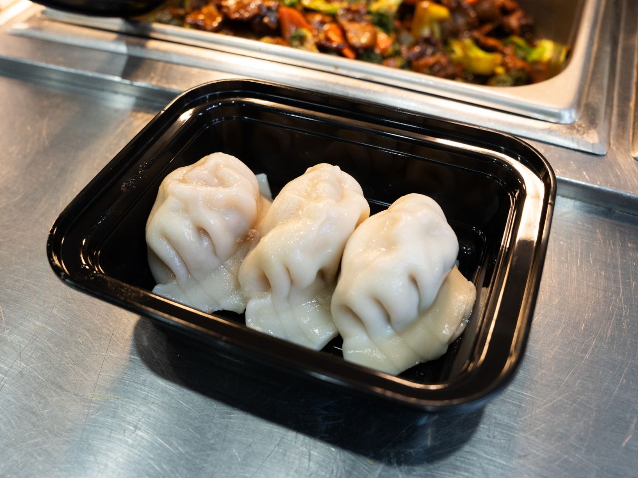 Steamed shrimp dumplings with translucent wrapper at Kennys Wok, a Chinese Restaurant in Philadelphia