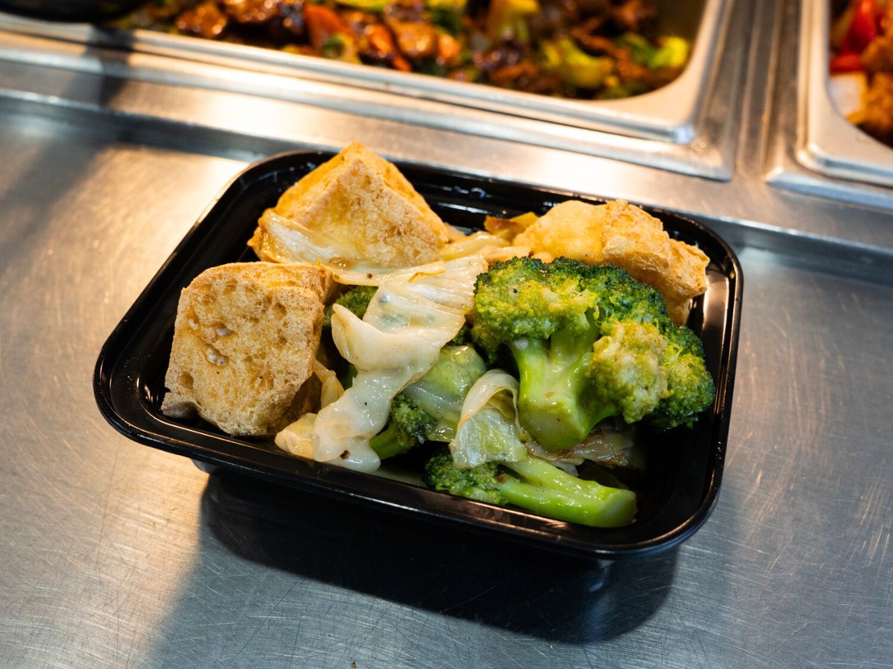 Fried tofu with broccoli and cabbage at Kennys Wok, a Chinese Restaurant in Philadelphia