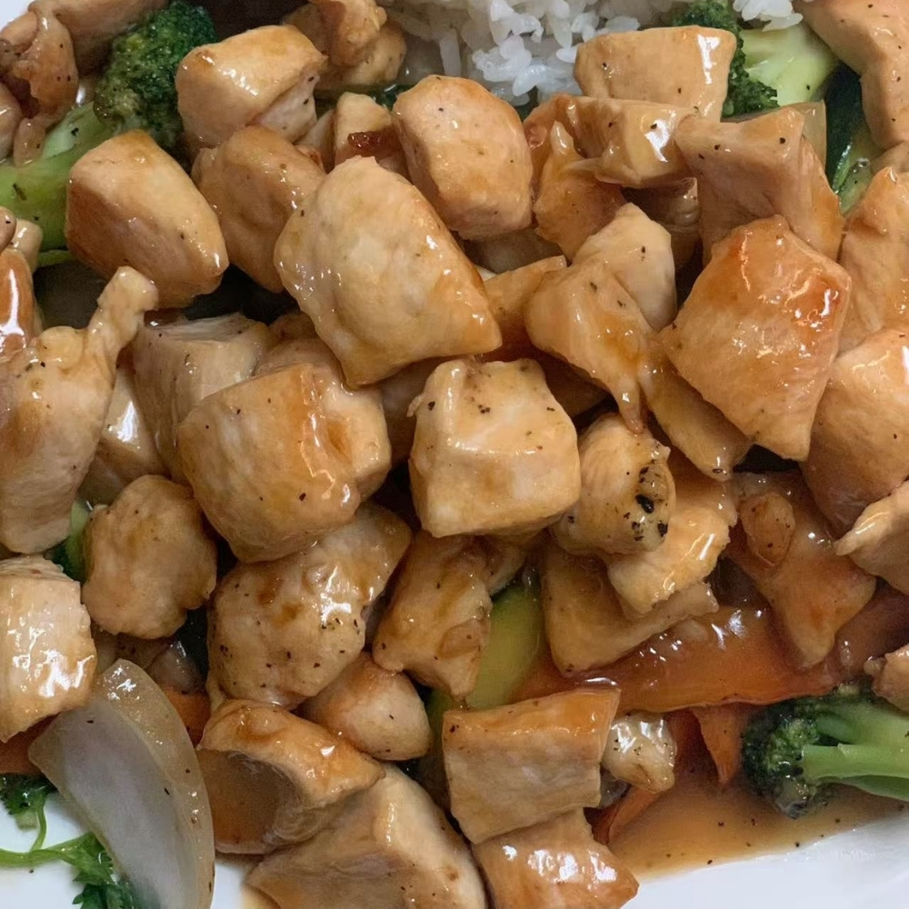 Teriyaki diced chicken with broccoli and side rice