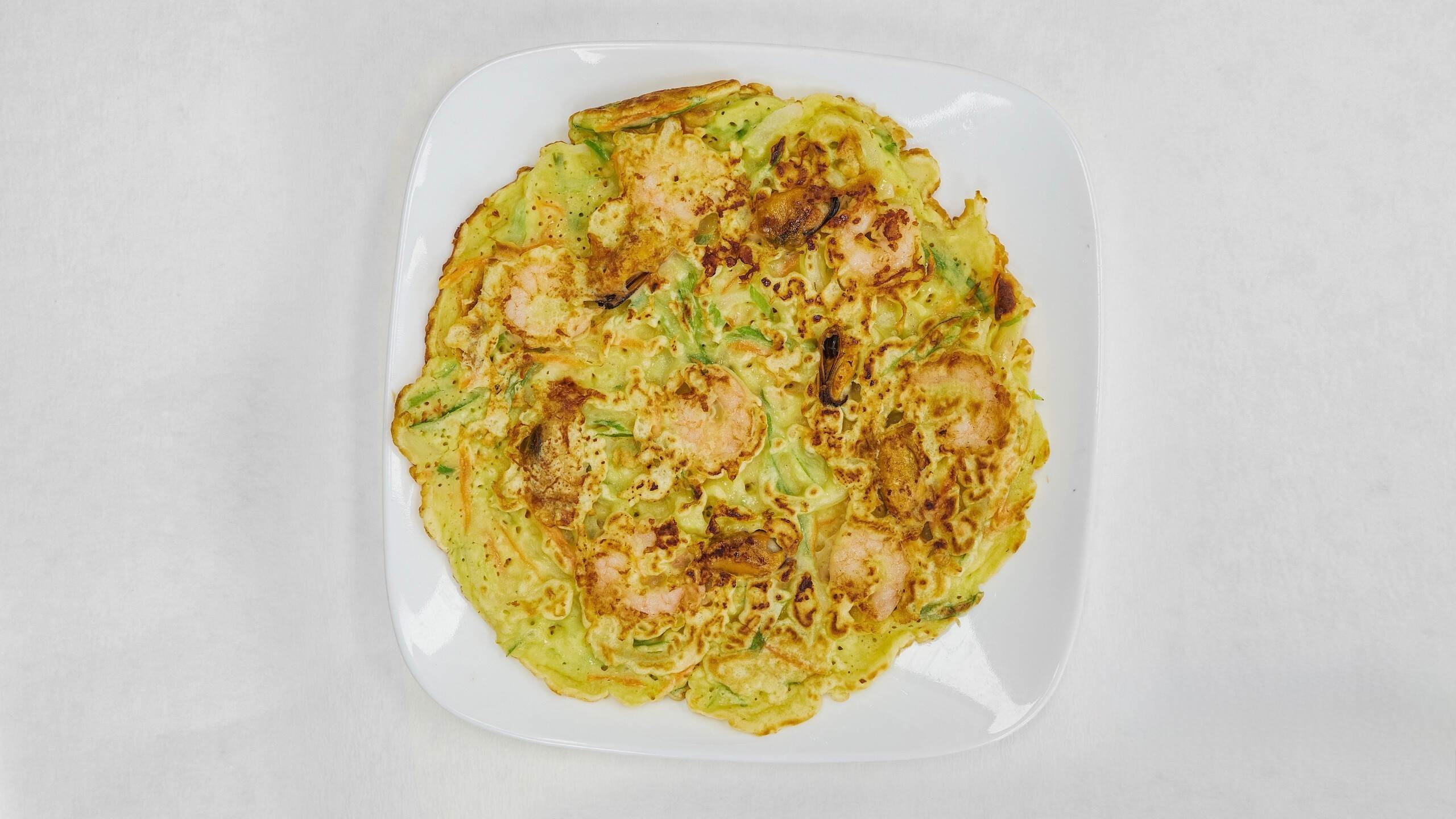 Seafood - filled pancake, fresh & tasty at Kimchi & Ramen Express Train,a Korean Restaurant in Cape Elizabeth