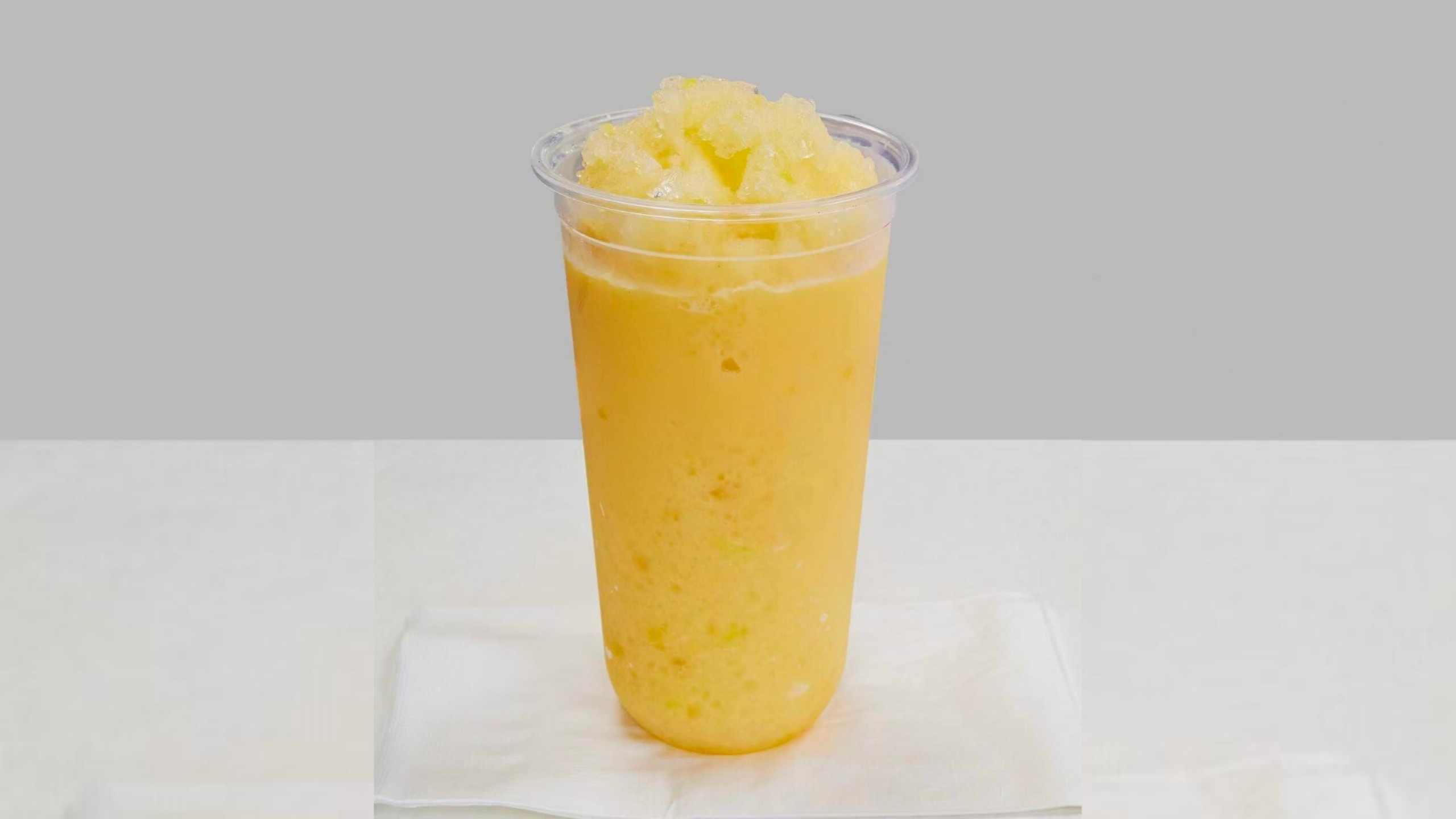 Fresh mango smoothie, icy & fruity at Kimchi & Ramen Express Train,a Korean Restaurant in Cape Elizabeth