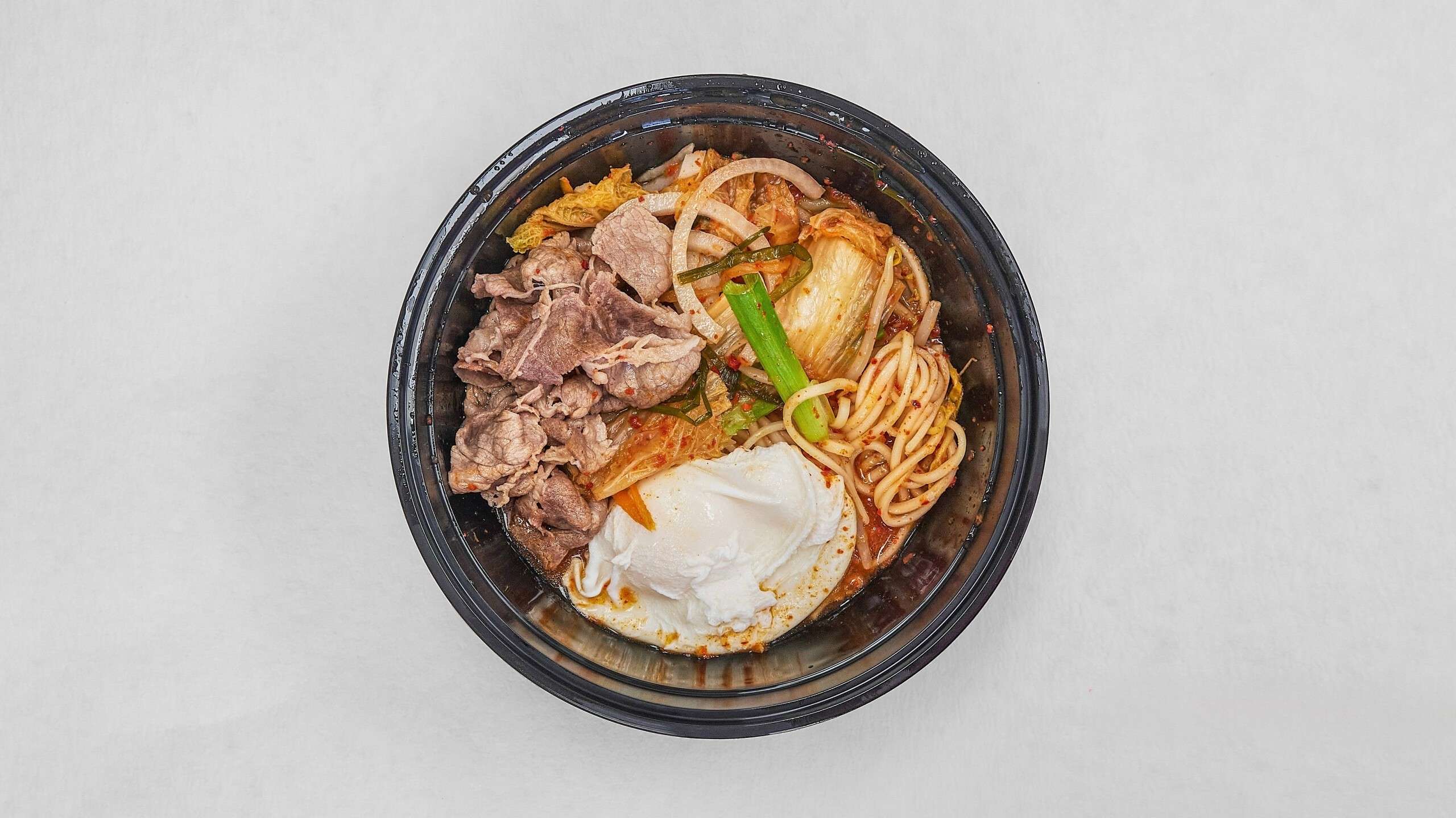 Spicy beef ramen with kimchi, egg & veggies at Kimchi & Ramen Express Train,a Korean Restaurant in Cape Elizabeth
