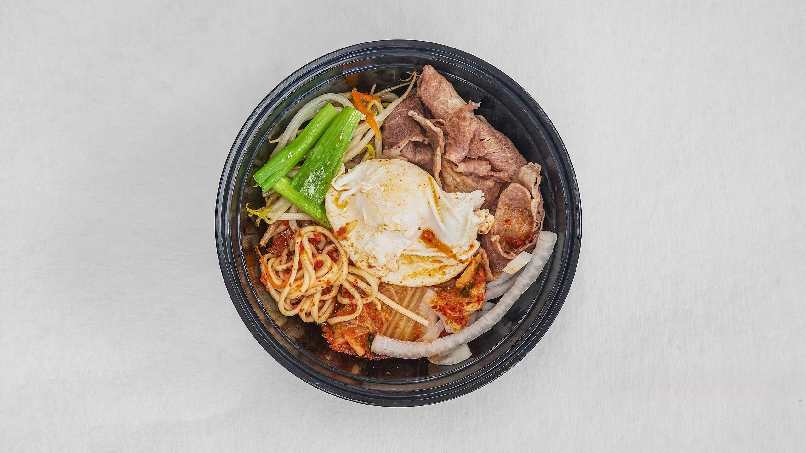 Pork kimchi ramen with egg & veggies at Kimchi & Ramen Express Train,a Korean Restaurant in Cape Elizabeth