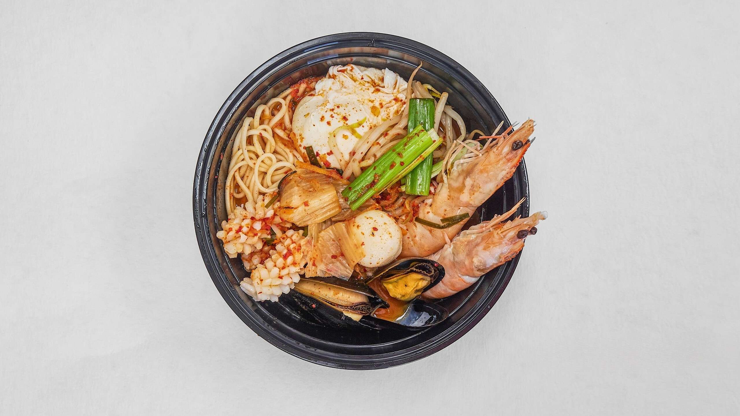 Seafood - loaded kimchi ramen, spicy & fresh at Kimchi & Ramen Express Train,a Korean Restaurant in Cape Elizabeth