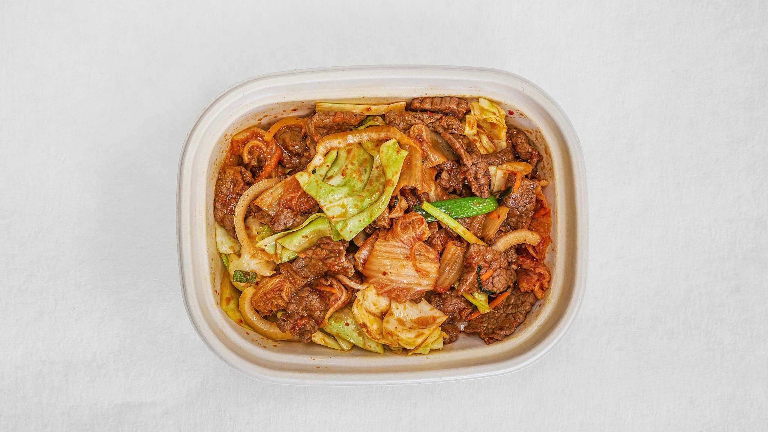 Kimchi beef rice bowl, veggies & savory at Kimchi & Ramen Express Train,a Korean Restaurant in Cape Elizabeth