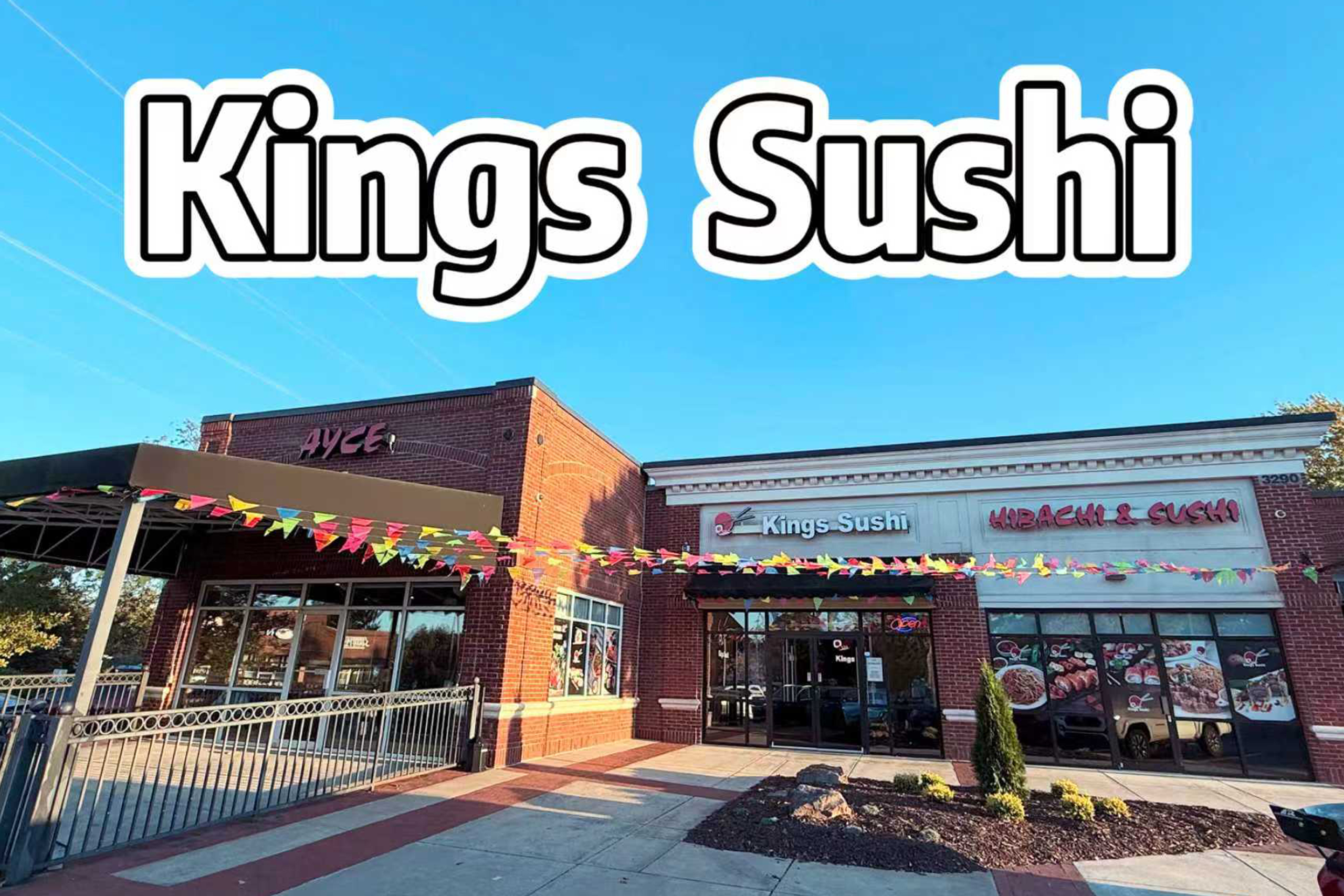 Bright exterior with festive banners at Kings Sushi, a Japanese Restaurant in Buford