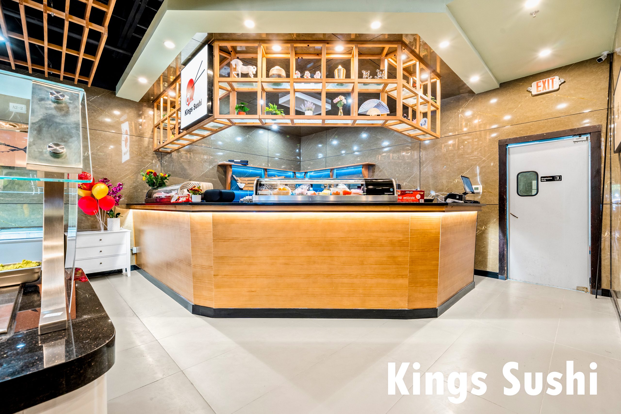 Stylish bar counter with decor at Kings Sushi, a Japanese Restaurant in Buford