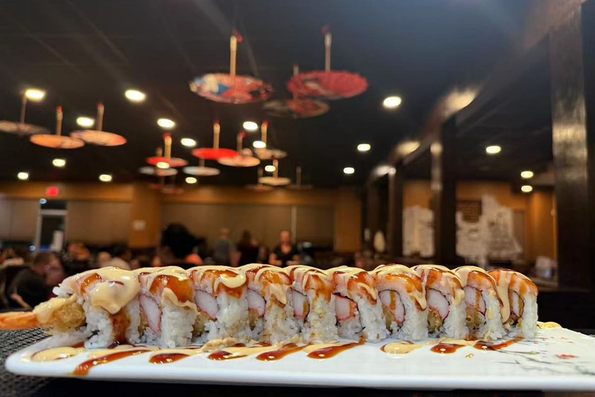 Shrimp tempura sushi roll with crab and two sauces in restaurant at Kings Sushi, a Japanese Restaurant in Summerville