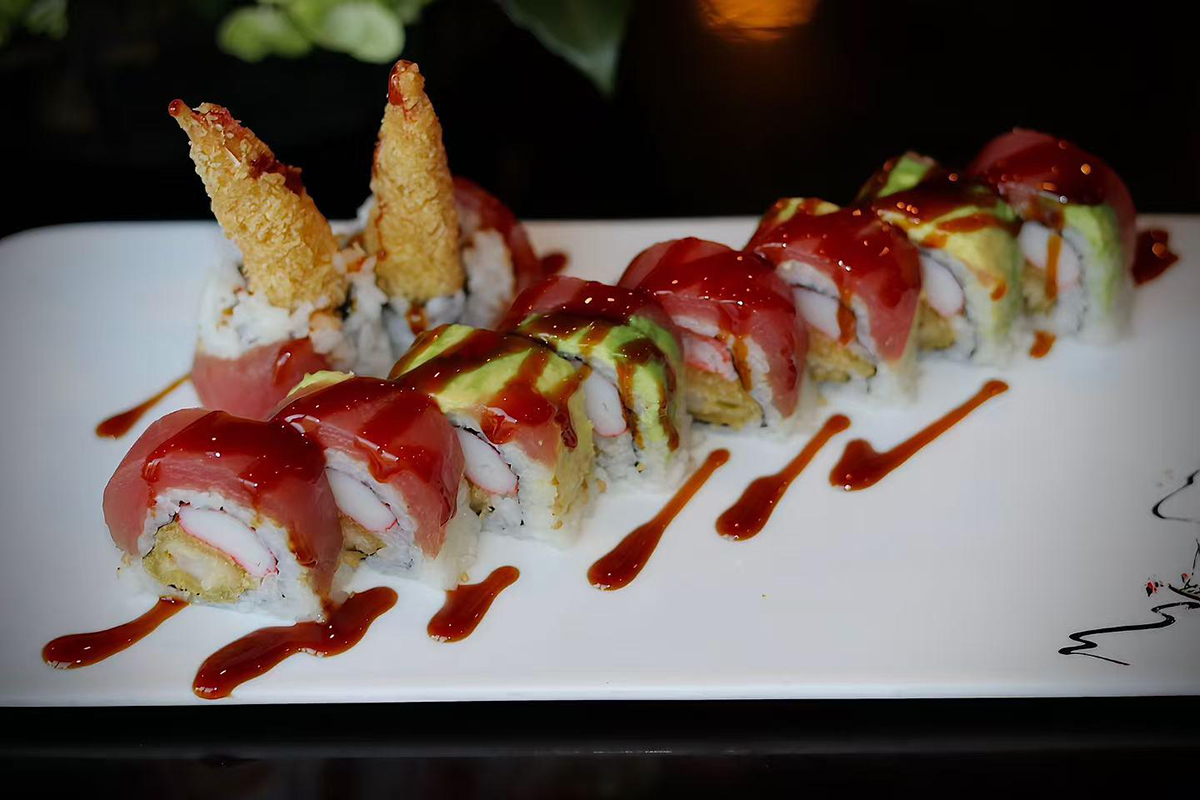 Sushi roll with tempura shrimp tuna avocado and red sauce at Kings Sushi, a Japanese Restaurant in Summerville