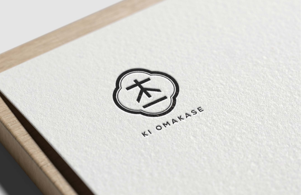 Embossed brand logo printed on premium paper at Ki Omakase, a Sushi Restaurant in Little Neck