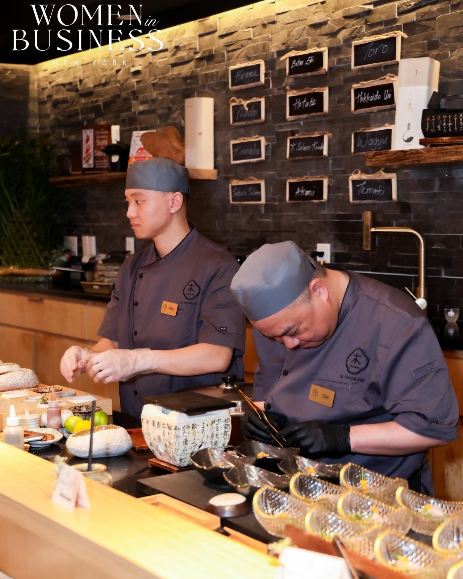 Two chefs craft delicate sushi side by side at bar at Ki Omakase, a Sushi Restaurant in Little Neck