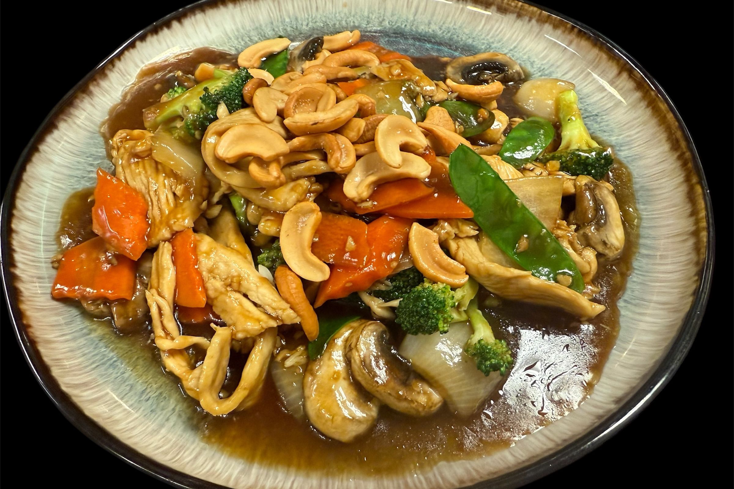 Chicken cashew stir-fry with vegetables in brown sauce at Kirin Asian Fusion, an Asian Restaurant in Sioux City