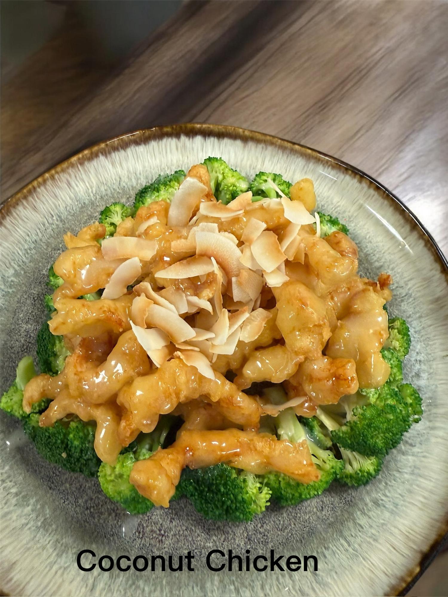 Coconut glazed chicken over fresh broccoli with coconut flakes at Kirin Asian Fusion Restaurant in Sioux City
