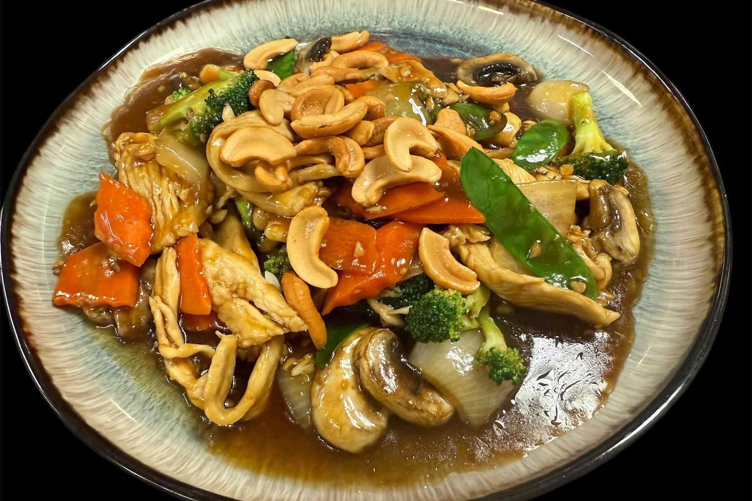 Cashew chicken stir fry with mushrooms, broccoli and mixed vegetables at Kirin Asian Fusion Restaurant in Sioux City