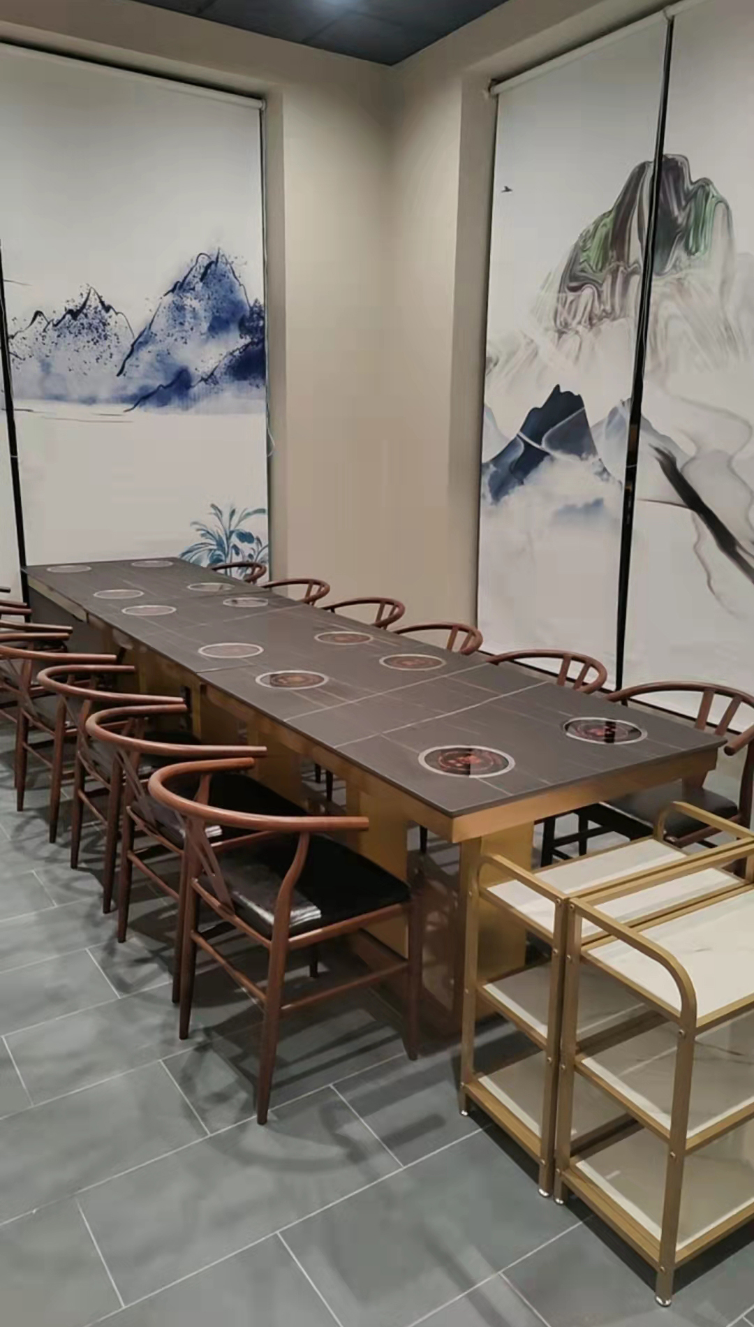 Long hot pot dining table with built-in burners at Kirin Hot Pot, a Chinese Restaurant in Broomfield
