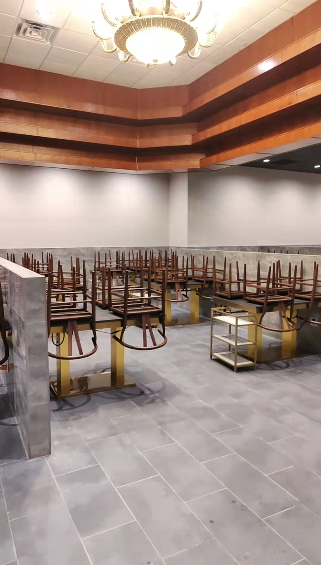 Stacked dining tables and chairs at Kirin Hot Pot, a Chinese Restaurant in Broomfield